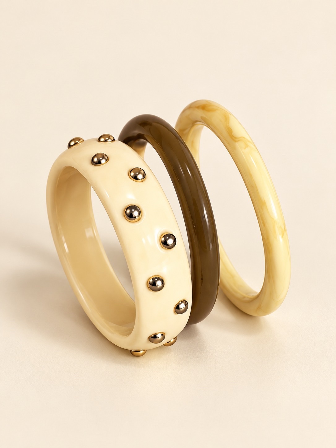 Set de pulseras beige